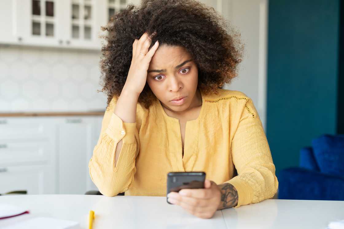 A lady stressed over a call