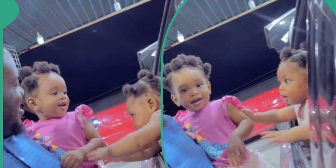 Nigerian couple, baby girl, looks alike Nigerian couple, baby girl, looks alike