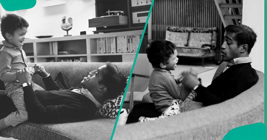 A young Mark Sydney plays with his father, Sammy Davis Jr., on a couch.