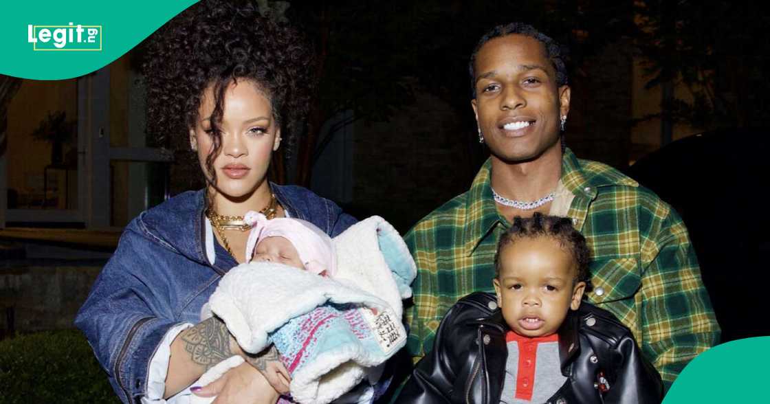 Rihanna and her family pose for the camera.