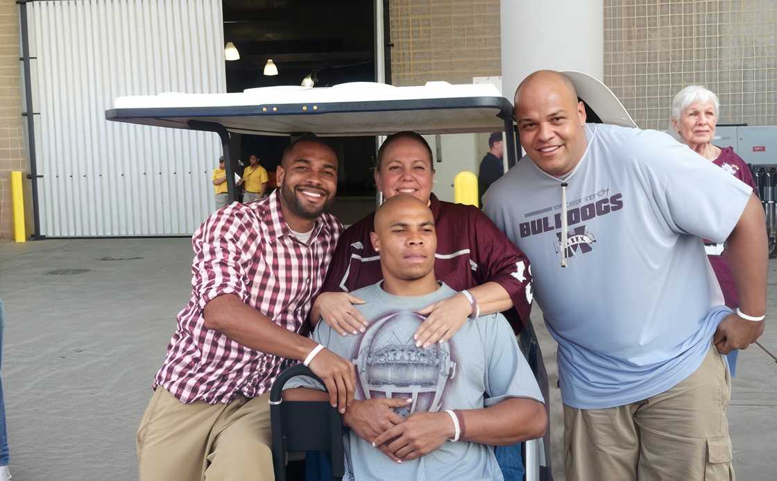 Dak Prescott and his family posing for a photo Dak Prescott and his family posing for a photo