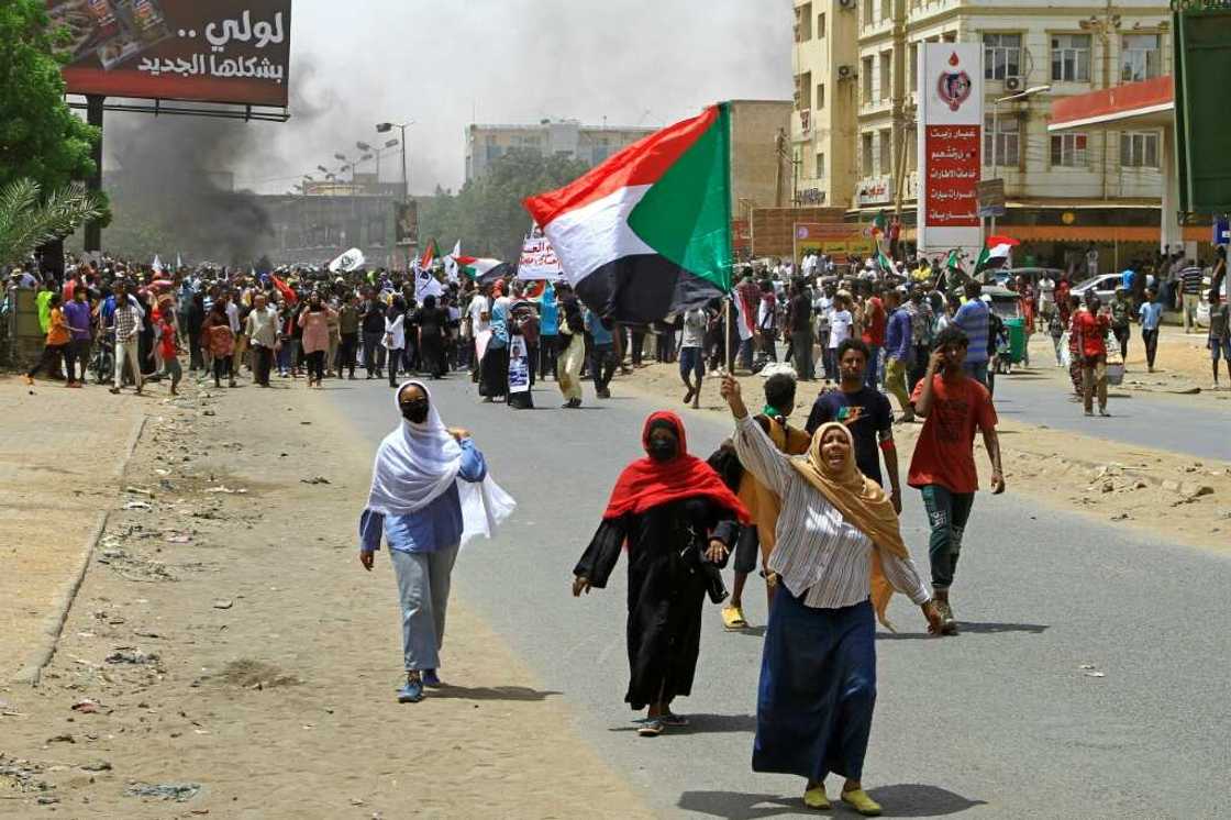 Sudanese anti-coup protesters march during a demonstration in Omdurman, the capital Khartoum's twin city, on June 30 Sudanese anti-coup protesters march during a demonstration in Omdurman, the capital Khartoum's twin city, on June 30