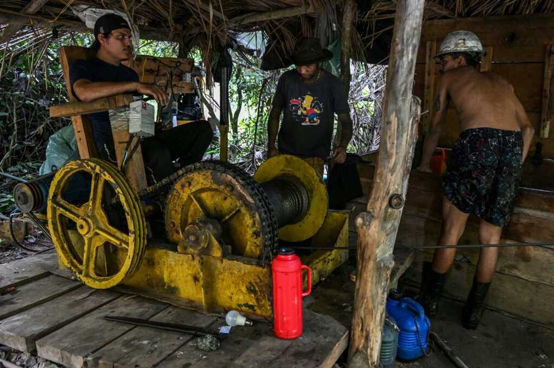 'Garimpeiros,' as illegal miners are known in Brazil, live and work on constant alert in case of a police raid 'Garimpeiros,' as illegal miners are known in Brazil, live and work on constant alert in case of a police raid