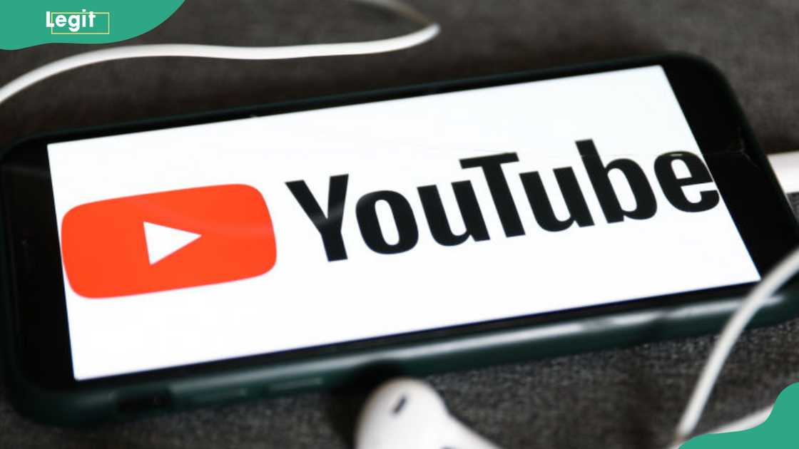 A phone screen displaying the YouTube icon