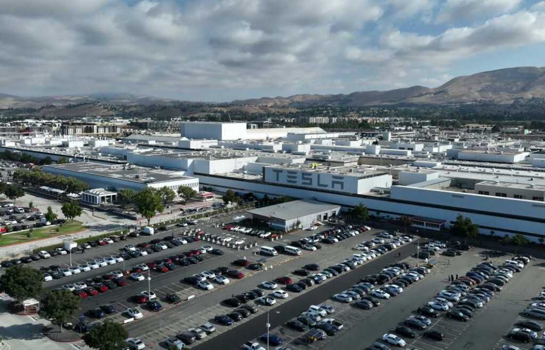 A lawsuit filed by a US anti-discrimination commission contends that abusive graffiti aimed at Black workers was part of "pervasive" racism at the electric car maker's plant in Fremont, California A lawsuit filed by a US anti-discrimination commission contends that abusive graffiti aimed at Black workers was part of "pervasive" racism at the electric car maker's plant in Fremont, California