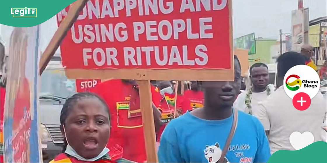 Ghanaians protest on the street.