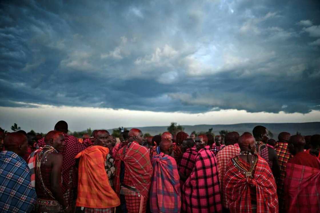 Maasai men gather to observe a traditional rite of passage last year at the Masai-Mara National Reserve Maasai men gather to observe a traditional rite of passage last year at the Masai-Mara National Reserve