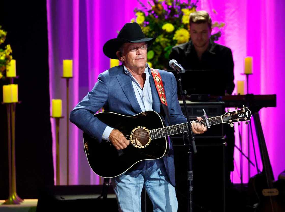 George Strait performs at the Grand Ole Opry in Nashville, Tennessee George Strait performs at the Grand Ole Opry in Nashville, Tennessee