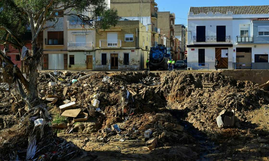 The October 29 floods washed away roads and rail lines, submerged fields and gutted homes and businesses