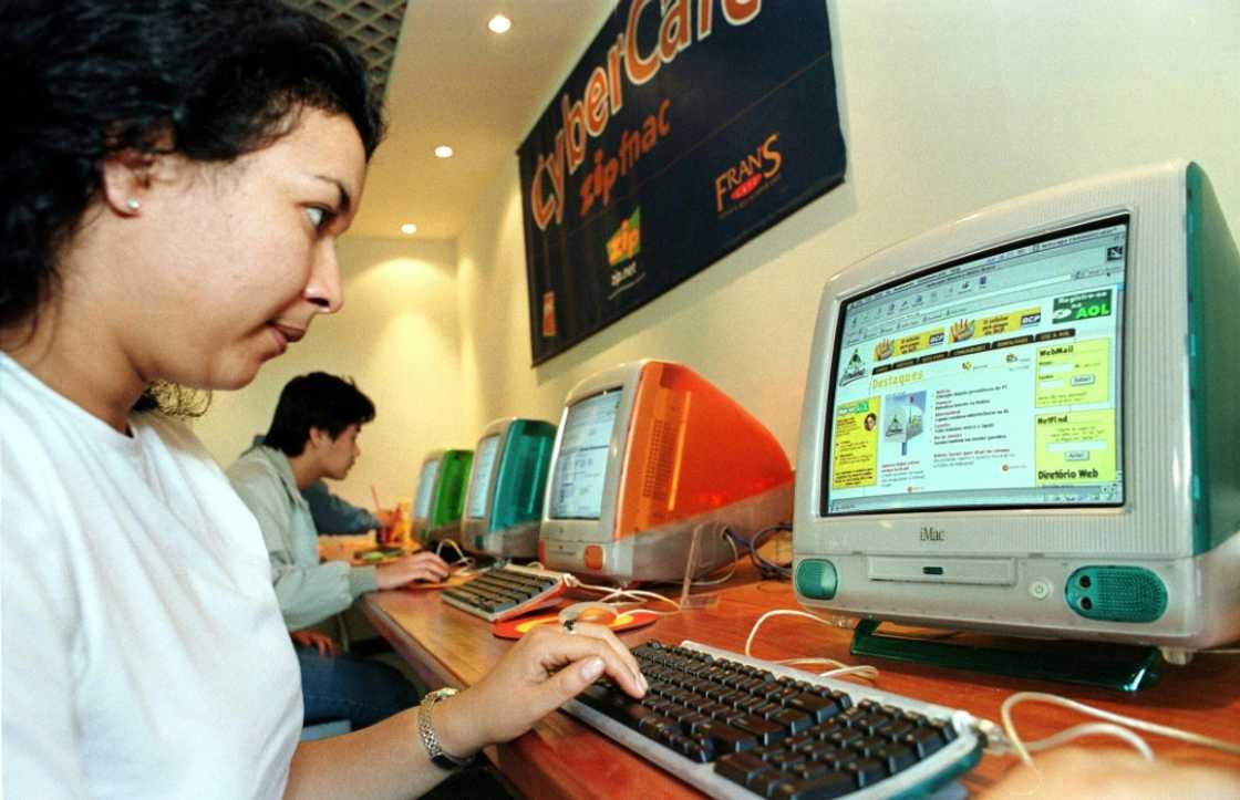 Once upon a time: Logging on to AOL at a Sao Paulo cybercafe in 1999 Once upon a time: Logging on to AOL at a Sao Paulo cybercafe in 1999