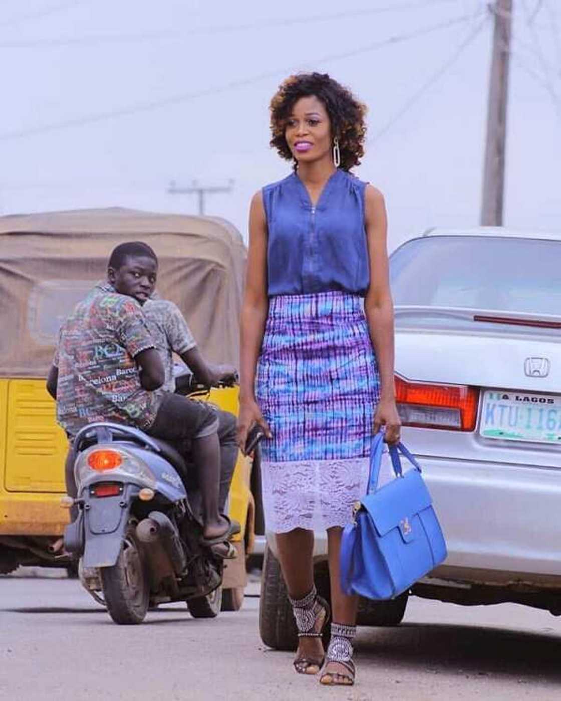 Adire styles for ladies: midi skirt with lace