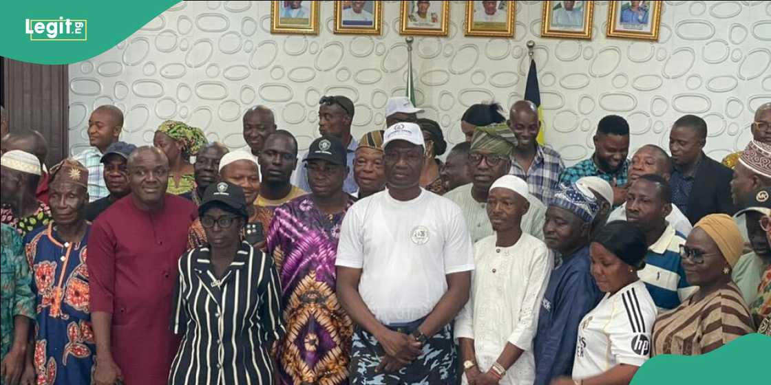 Commercial drivers listening to police officers during a road safety outreach Commercial drivers listening to police officers during a road safety outreach