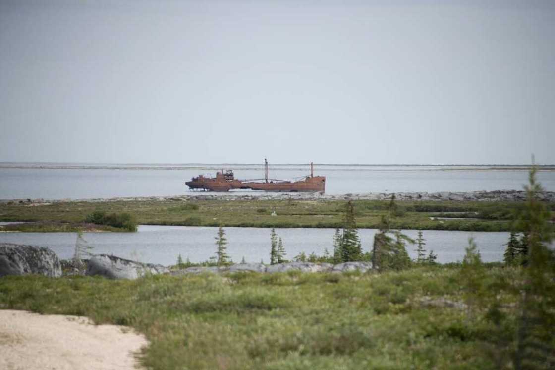 Rusty cargoship wreckage lies in the shallow waters of the Hudson Bay Rusty cargoship wreckage lies in the shallow waters of the Hudson Bay