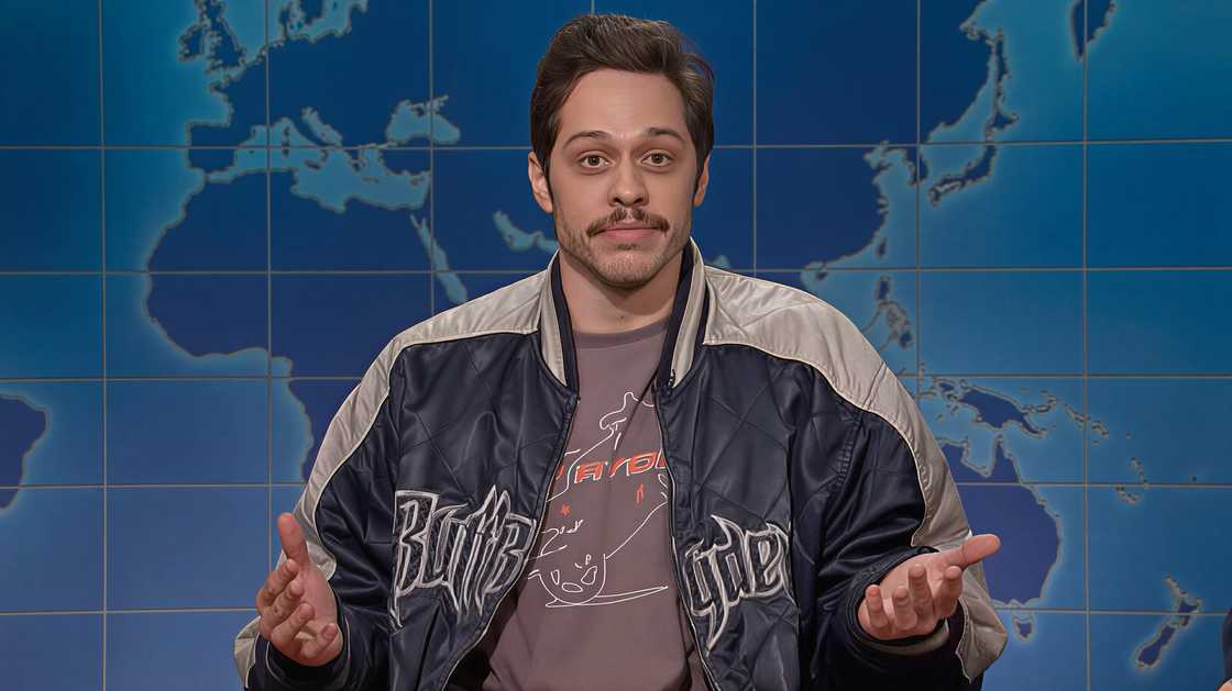 Pete Davidson gestures during a return to the Weekend Update segment of Saturday Night Live