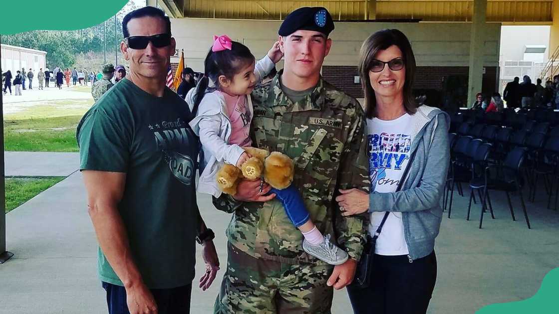 Jacob Duran with his father, daughter and mother.