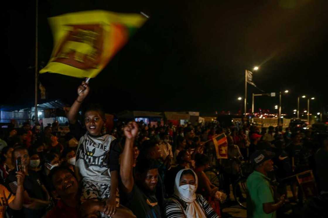 Jubilant protesters celebrate after the ouster of Sri Lankan president Gotabaya Rajapaksa