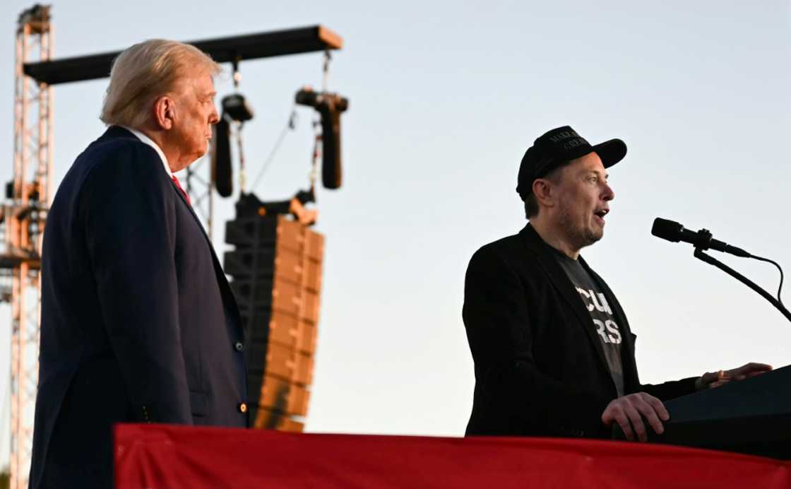 Elon Musk speaks on stage as he joins Donald Trump during a campaign rally Elon Musk speaks on stage as he joins Donald Trump during a campaign rally