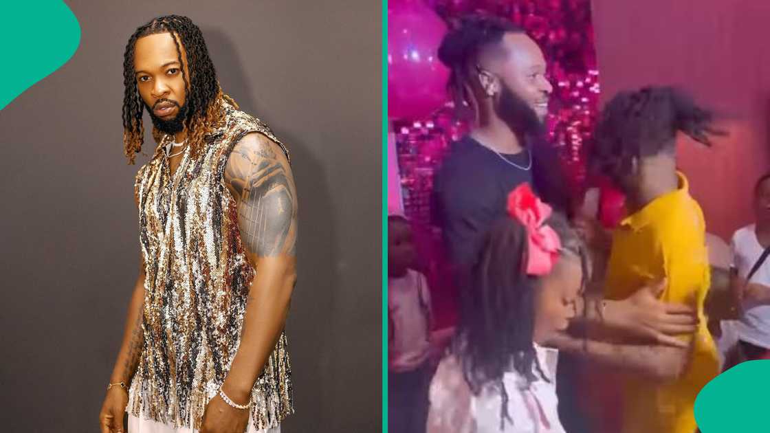 Flavour dances with his children.