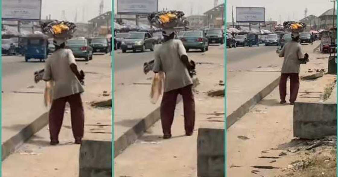 Elderly hawker walks slowly on the road, video stirs emotions Elderly hawker walks slowly on the road, video stirs emotions
