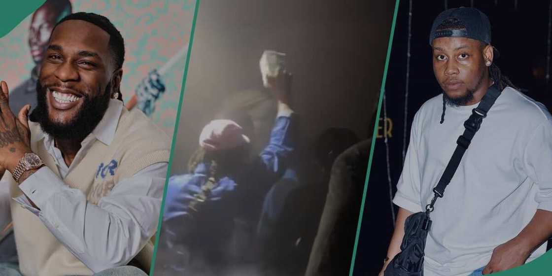 Burna Boy gives hype mam money at club. Burna Boy gives hype mam money at club.