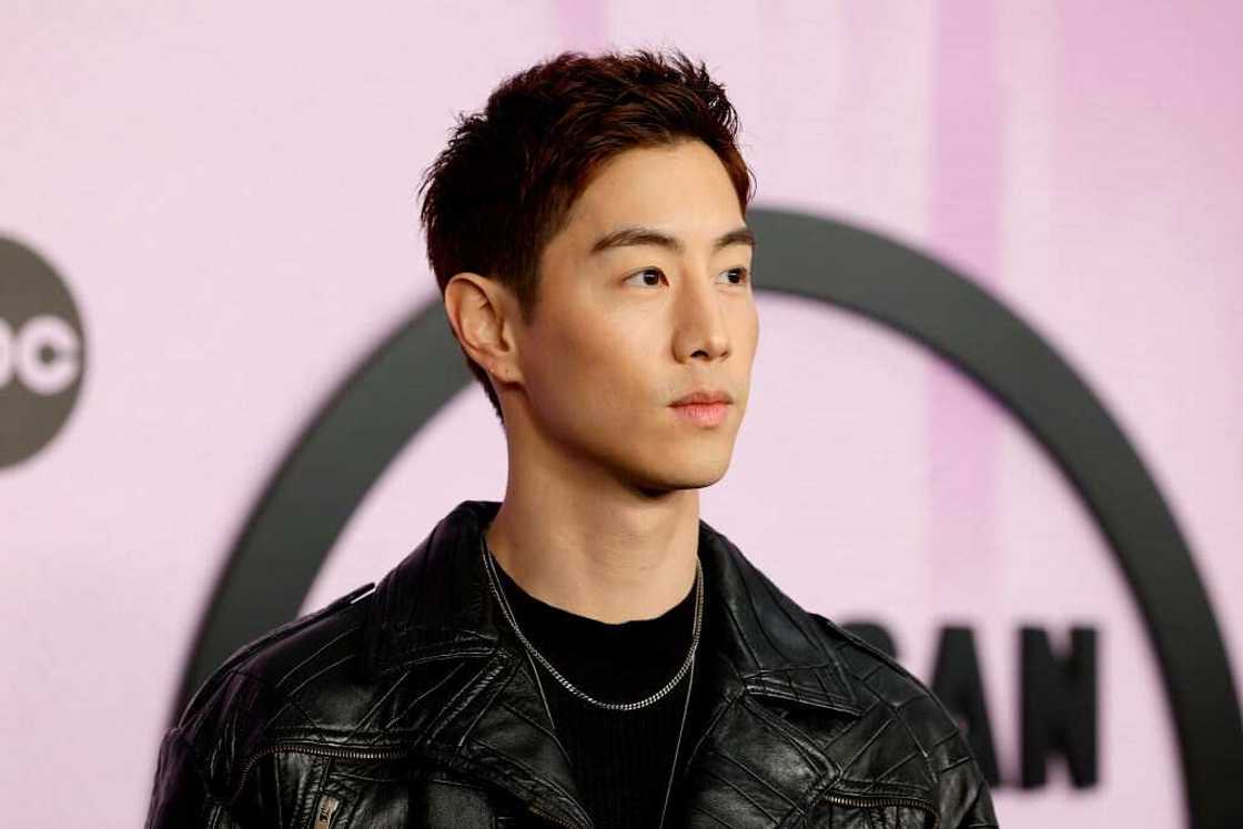 Mark Tuan attends the 2022 American Music Awards at Microsoft Theater Mark Tuan attends the 2022 American Music Awards at Microsoft Theater