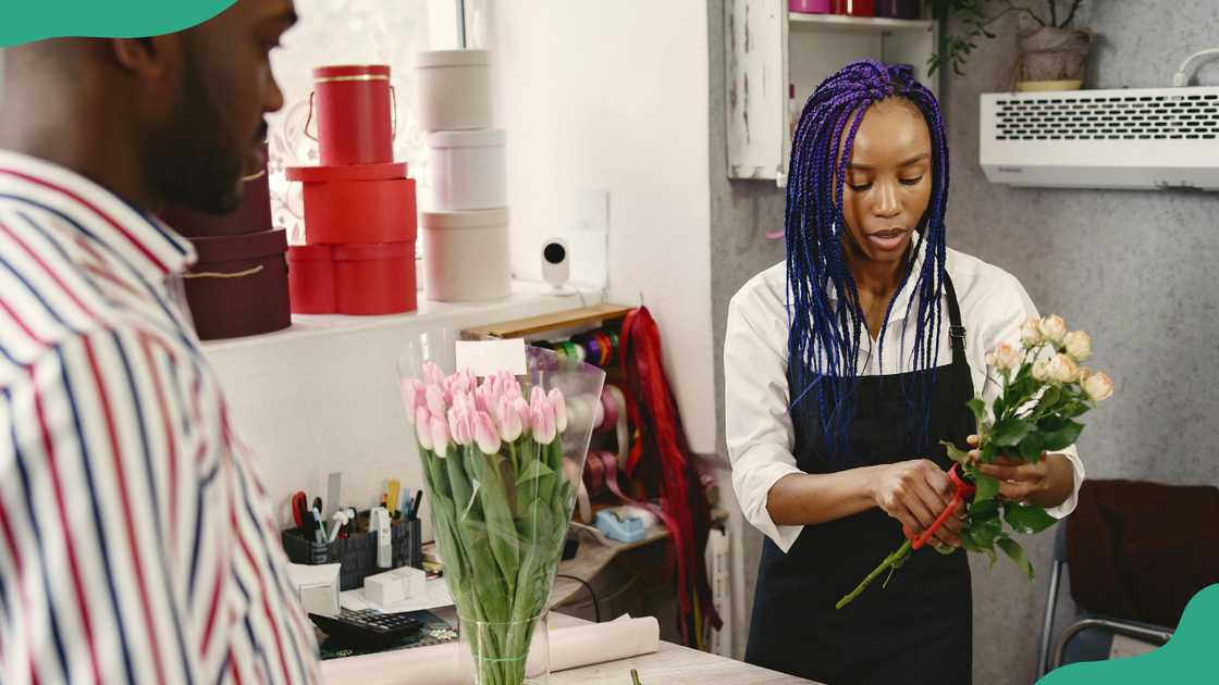 A woman runs a small flower business