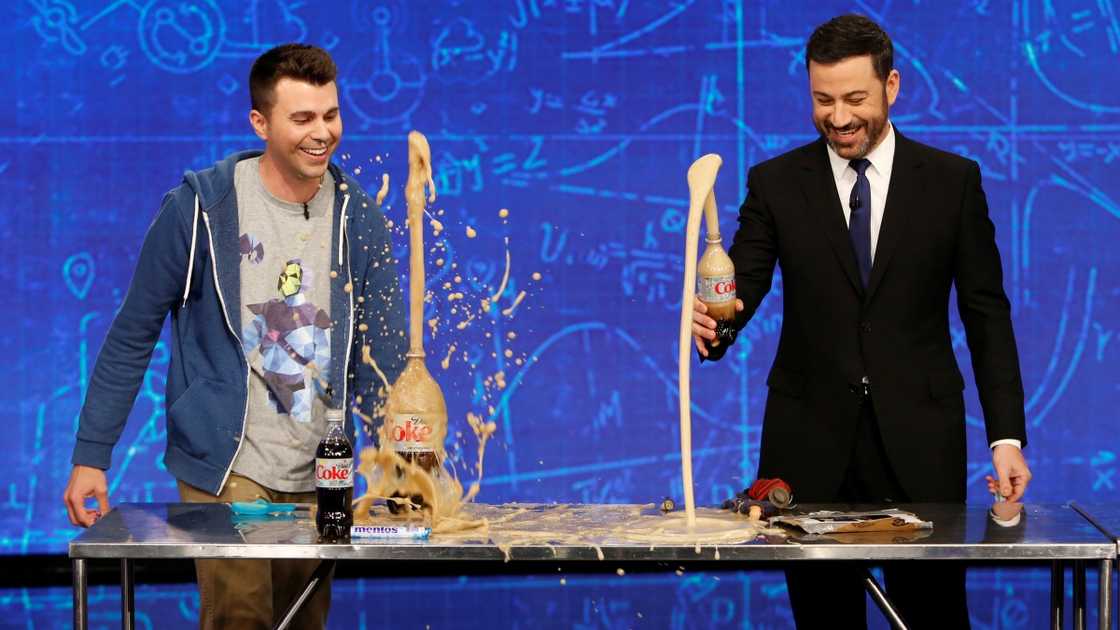 Mark Rober (L) and Jimmy Kimmel (R) conduct an experiment during an episode of his show