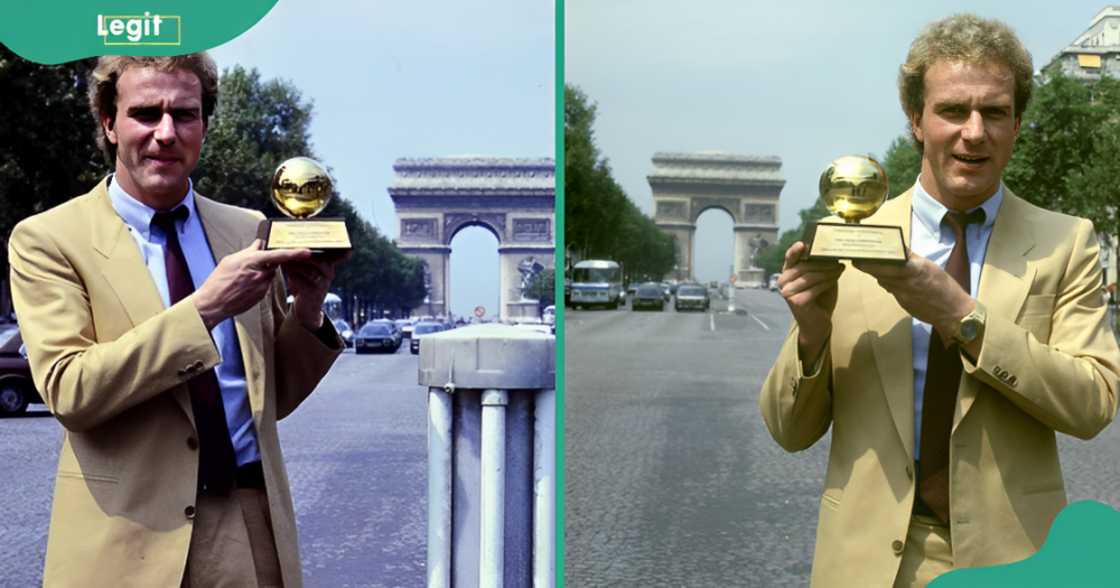 Karl-Heinz Rummenigge poses standing on the Avenue des Champs-Élysées with the 1981 Golden Ball award.