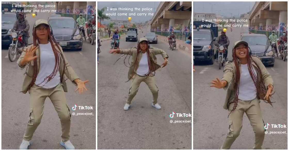 Female corps member dances, middle of the road Female corps member dances, middle of the road
