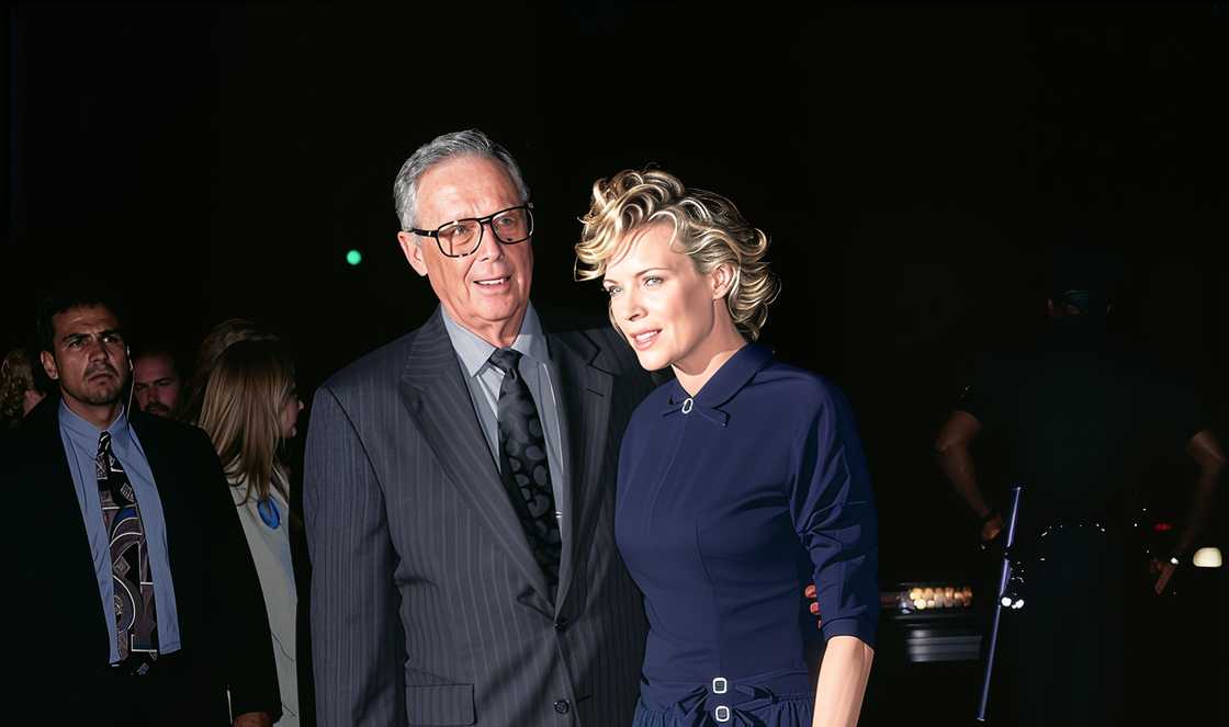 Donald Basinger (1923-2016) and his daughter, Kim Basinger, arrive at Mann's Chinese Theatre