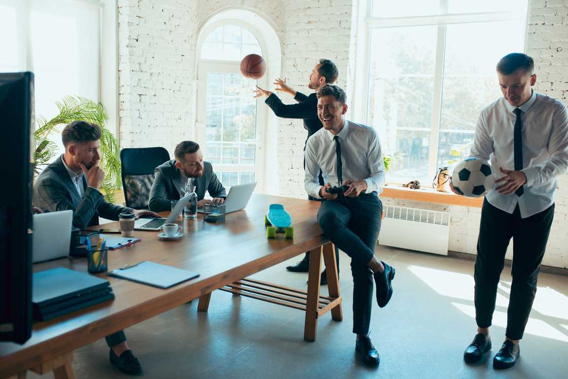 Employees having fun in the office. Employees having fun in the office.