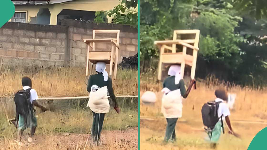 Mother helps her son to carry his chair to school.