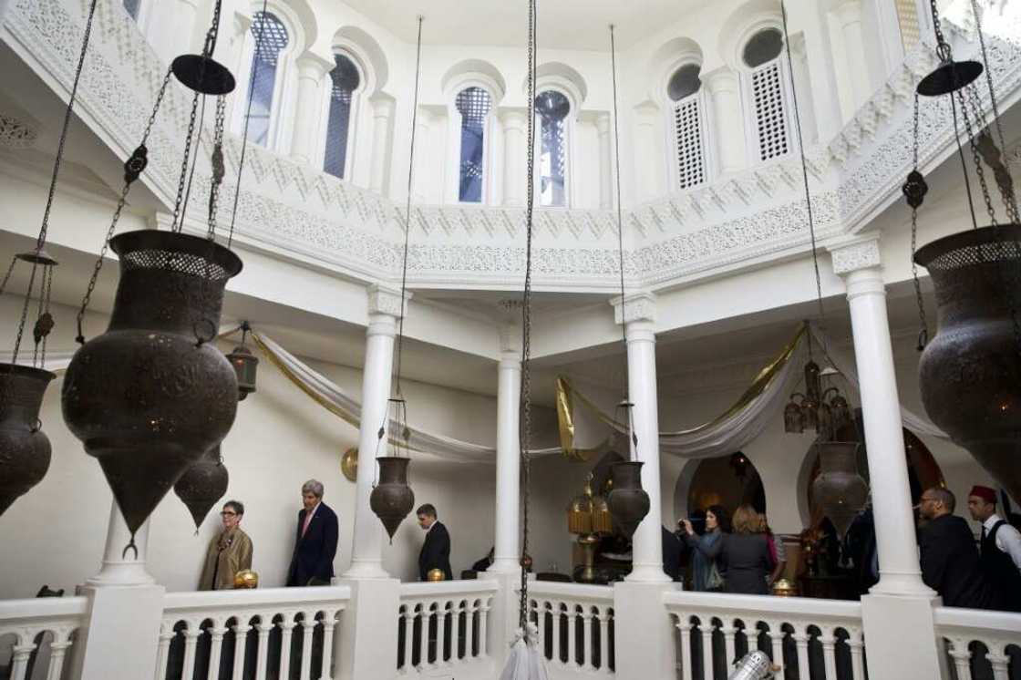 Rick's Cafe owner Kathy Kriger shows then US secretary of state John Kerry around the cafe in Casablanca in this file picture from April 4, 2014 Rick's Cafe owner Kathy Kriger shows then US secretary of state John Kerry around the cafe in Casablanca in this file picture from April 4, 2014
