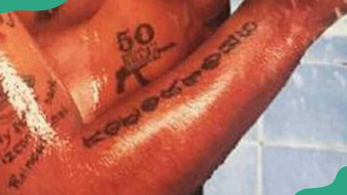 The rapper's Notorious forearm tattoo