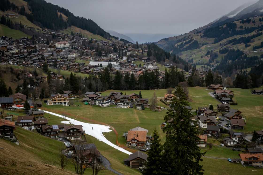 A slope amid a near-snowless landscape during the FIS Alpine ski World Cup events in the Swiss resort of Adelboden in January 2023