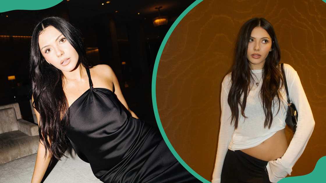 Atiana De La Hoya posing indoors in a black halter dress. The model standing in front of a plain, textured brown background Atiana De La Hoya posing indoors in a black halter dress. The model standing in front of a plain, textured brown background