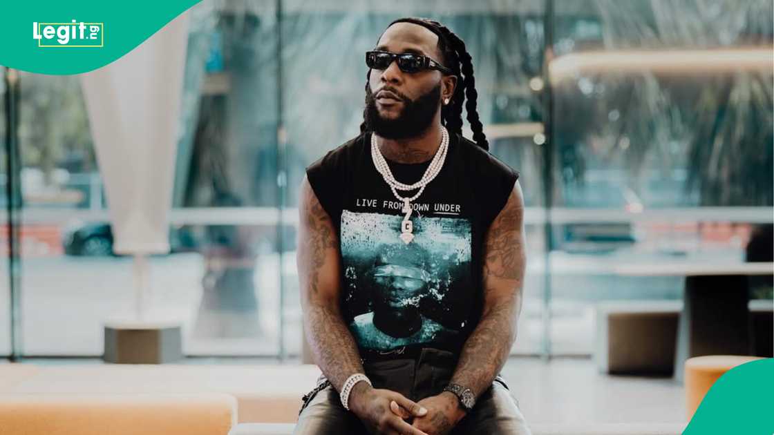 Burna Boy rejects gifts from fan named Davido during live session.