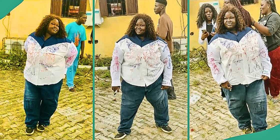 Chubby female graduate signs out of school Chubby female graduate signs out of school
