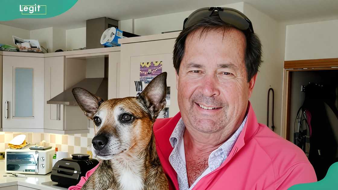 Bob Koepka in the kitchen with his pet