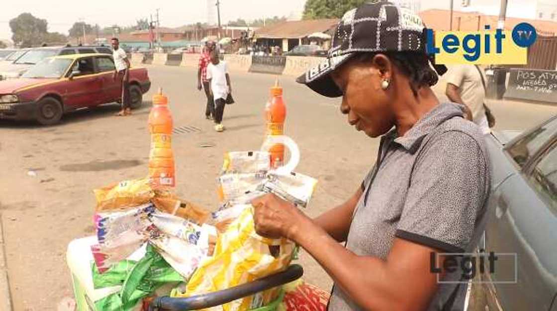 Madam Grace who sells ice cream in Benin, Edo state says she makes N3,000 daily. Photo credit: LegitTV Madam Grace who sells ice cream in Benin, Edo state says she makes N3,000 daily. Photo credit: LegitTV