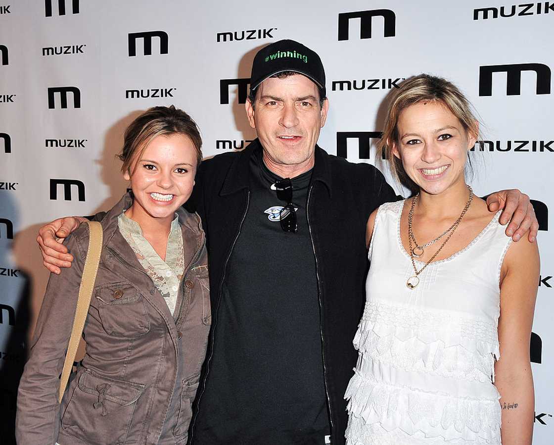 Bree Olson, Charlie Sheen, and Natalie Kenly at a music event