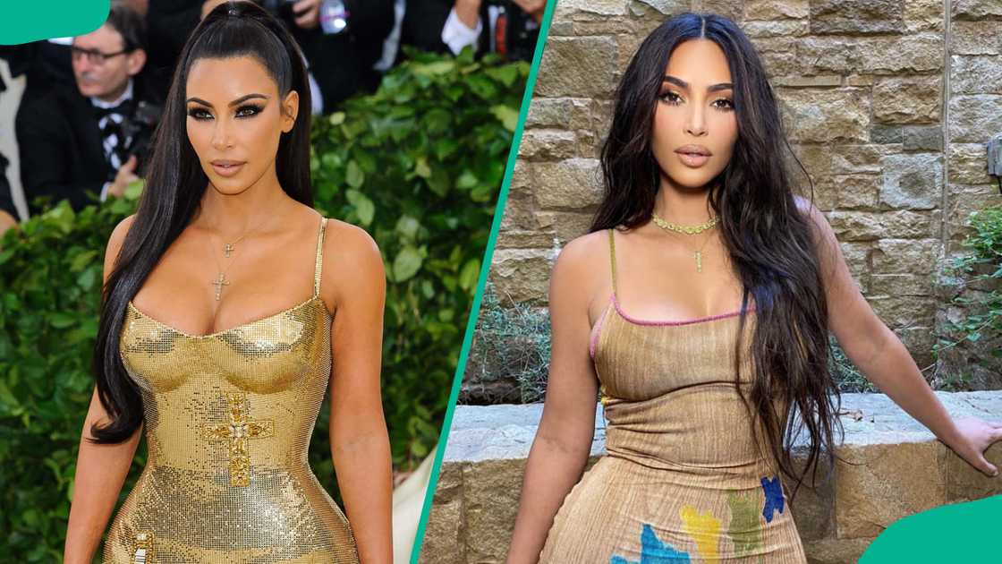 Kim Kardashian posing for the camera Kim Kardashian posing for the camera