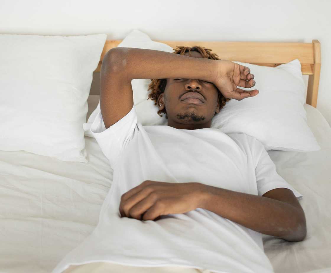 A man lying on the bed A man lying on the bed