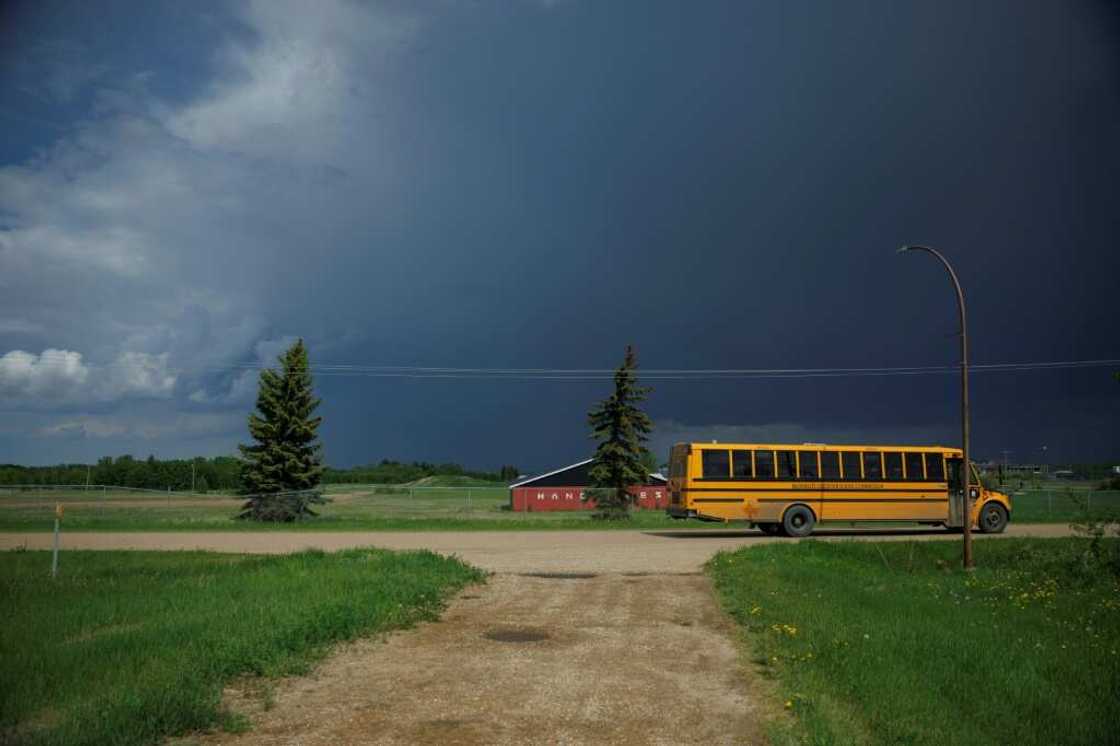 A yellow school bus on June 7 passes an empty lot where the Ermineskin Indian Residential School once stood in the Indigenous community of Maskwacis, Alberta. Pope Francis' end of July visit to Canada in which he is to offer apologies for more than a century of abuses at Indigenous residential schools, is talk of the town here, and surrounded with immense hope A yellow school bus on June 7 passes an empty lot where the Ermineskin Indian Residential School once stood in the Indigenous community of Maskwacis, Alberta. Pope Francis' end of July visit to Canada in which he is to offer apologies for more than a century of abuses at Indigenous residential schools, is talk of the town here, and surrounded with immense hope