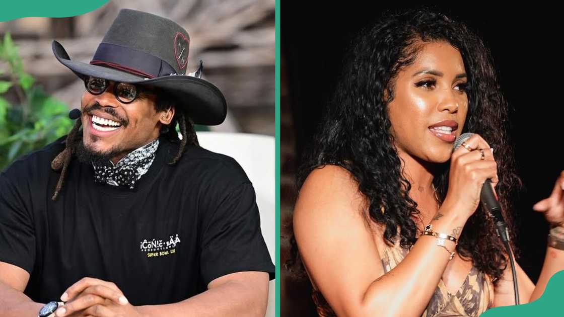 Cam Newton smiles. Jasmin Brown performs on stage Cam Newton smiles. Jasmin Brown performs on stage