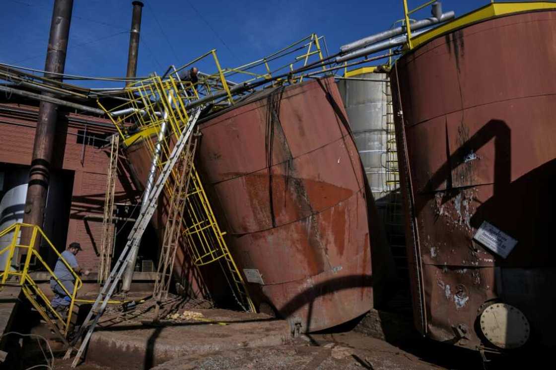 View of chemical tanks damaged after flooding at an industrial plant in Encantado, Rio Grande do Sul, Brazil, on May 22, 2024 View of chemical tanks damaged after flooding at an industrial plant in Encantado, Rio Grande do Sul, Brazil, on May 22, 2024