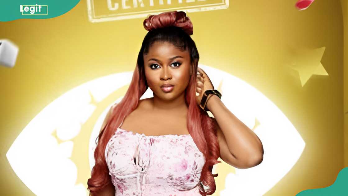 Imisi BBNaija posing with one hand on her neck Imisi BBNaija posing with one hand on her neck