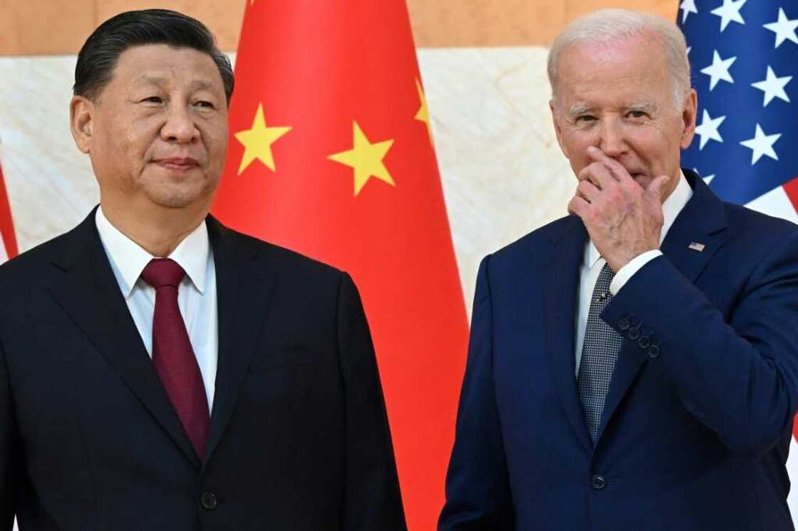 US President Joe Biden (R) and China's President Xi Jinping (L) meet on the sidelines of the G20 Summit in Nusa Dua on the Indonesian resort island of Bali on November 14, 2022 US President Joe Biden (R) and China's President Xi Jinping (L) meet on the sidelines of the G20 Summit in Nusa Dua on the Indonesian resort island of Bali on November 14, 2022