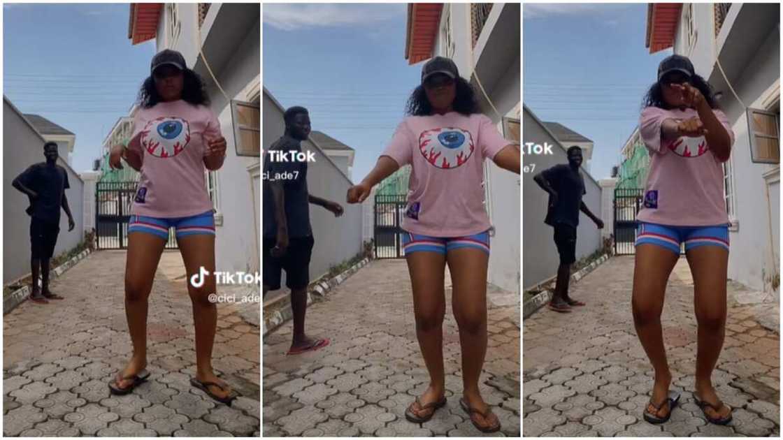 Lady danced in compound/gateman watched her. Lady danced in compound/gateman watched her.