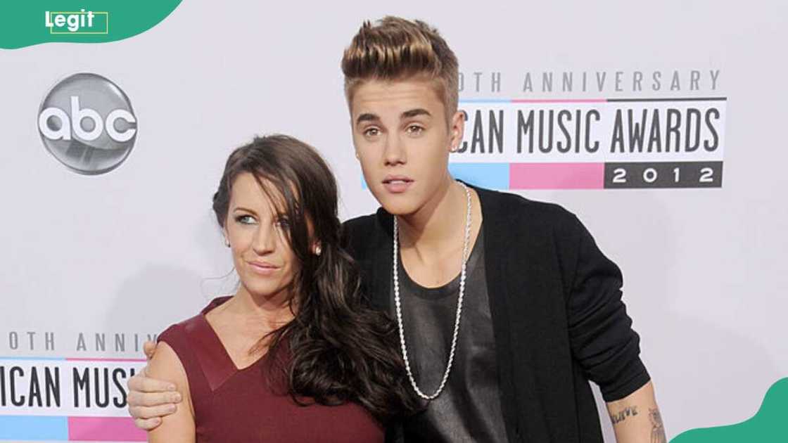 Singer Justin Bieber (R) and mom Pattie Mallette during the 40th Anniversary American Music Awards